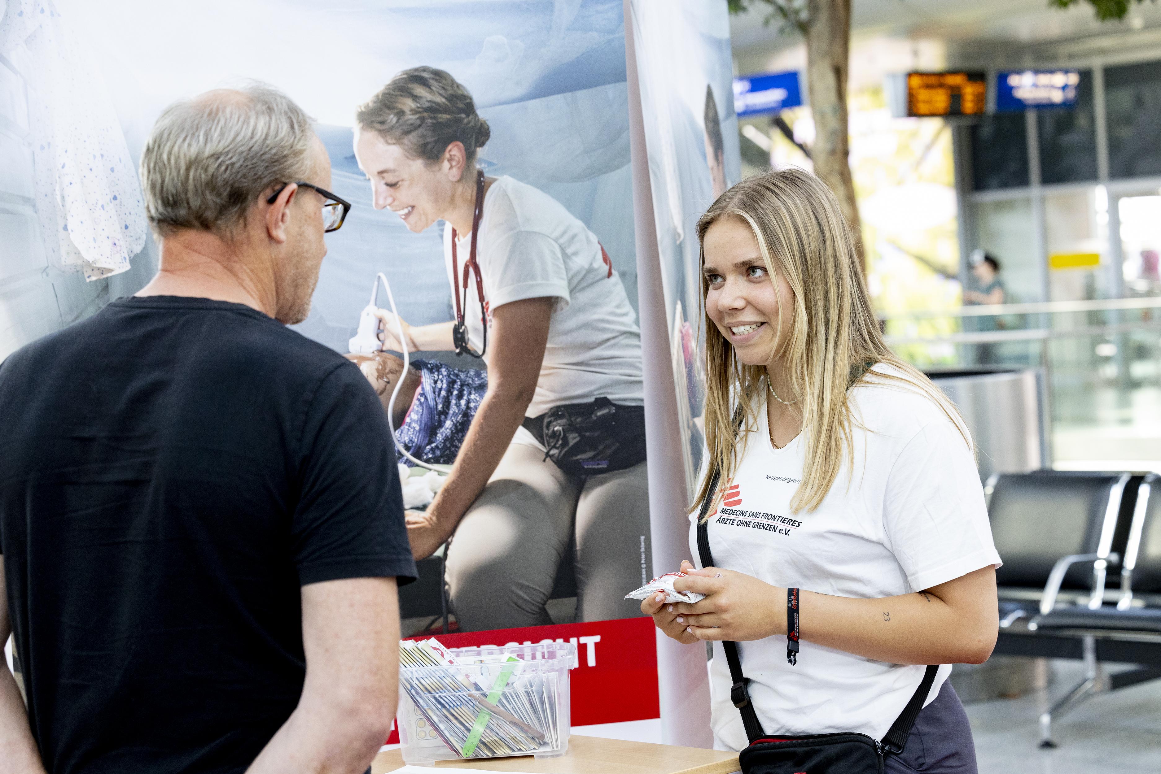 An MEDSF fundraiser talks to a potential donor